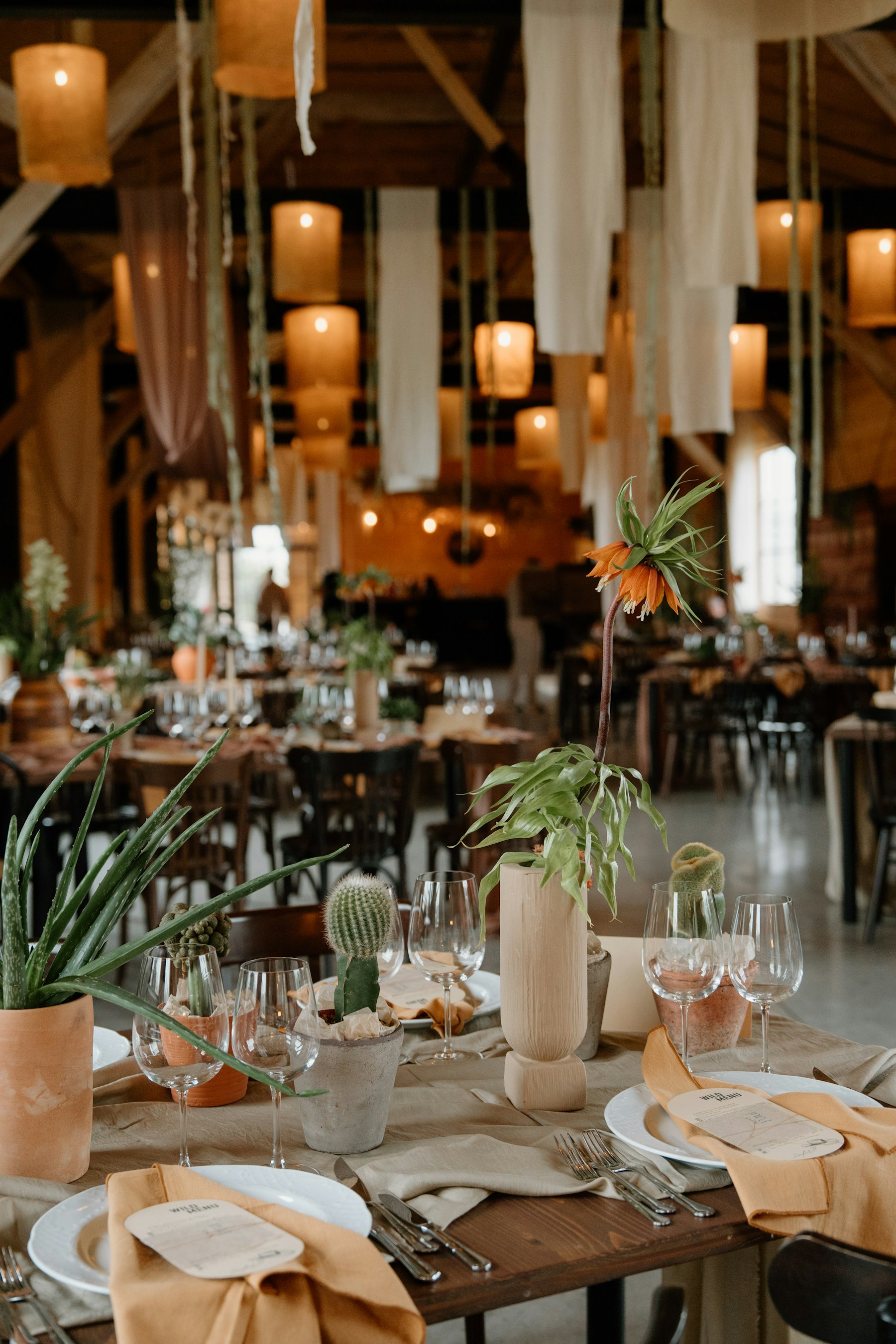 Stylish private event setting with ambient hanging lights